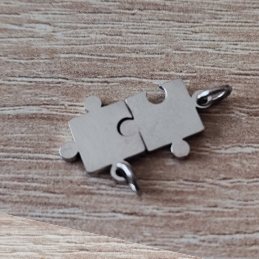 Dije de acero inoxidable puzzle